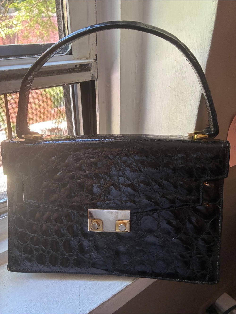 Pressed patent leather bag from France